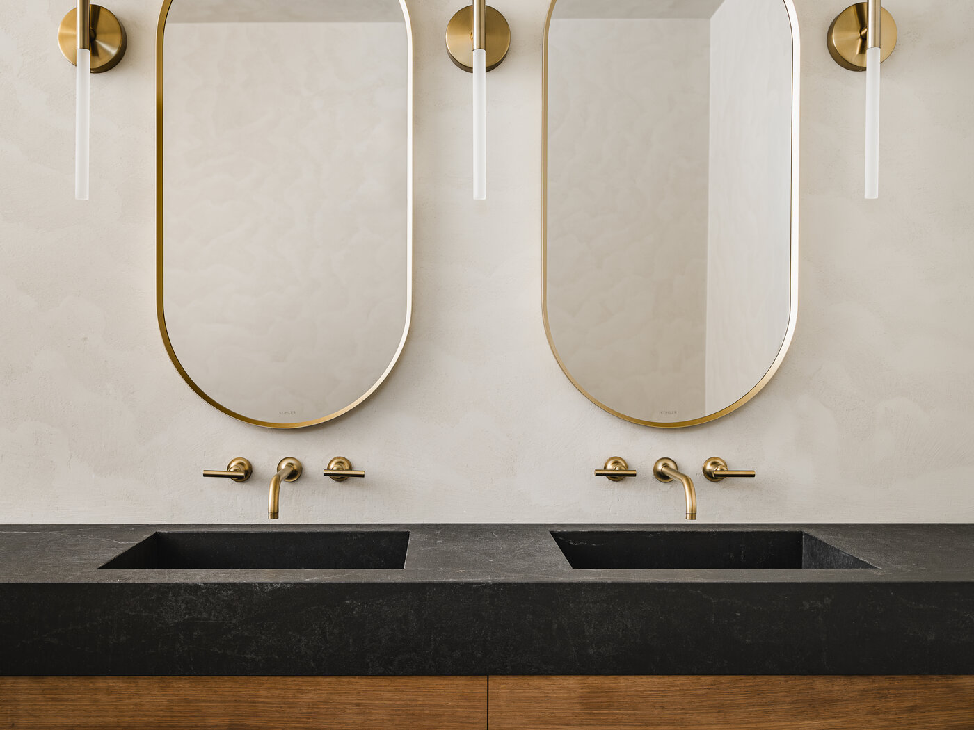 Custom double vanity with brass fixtures