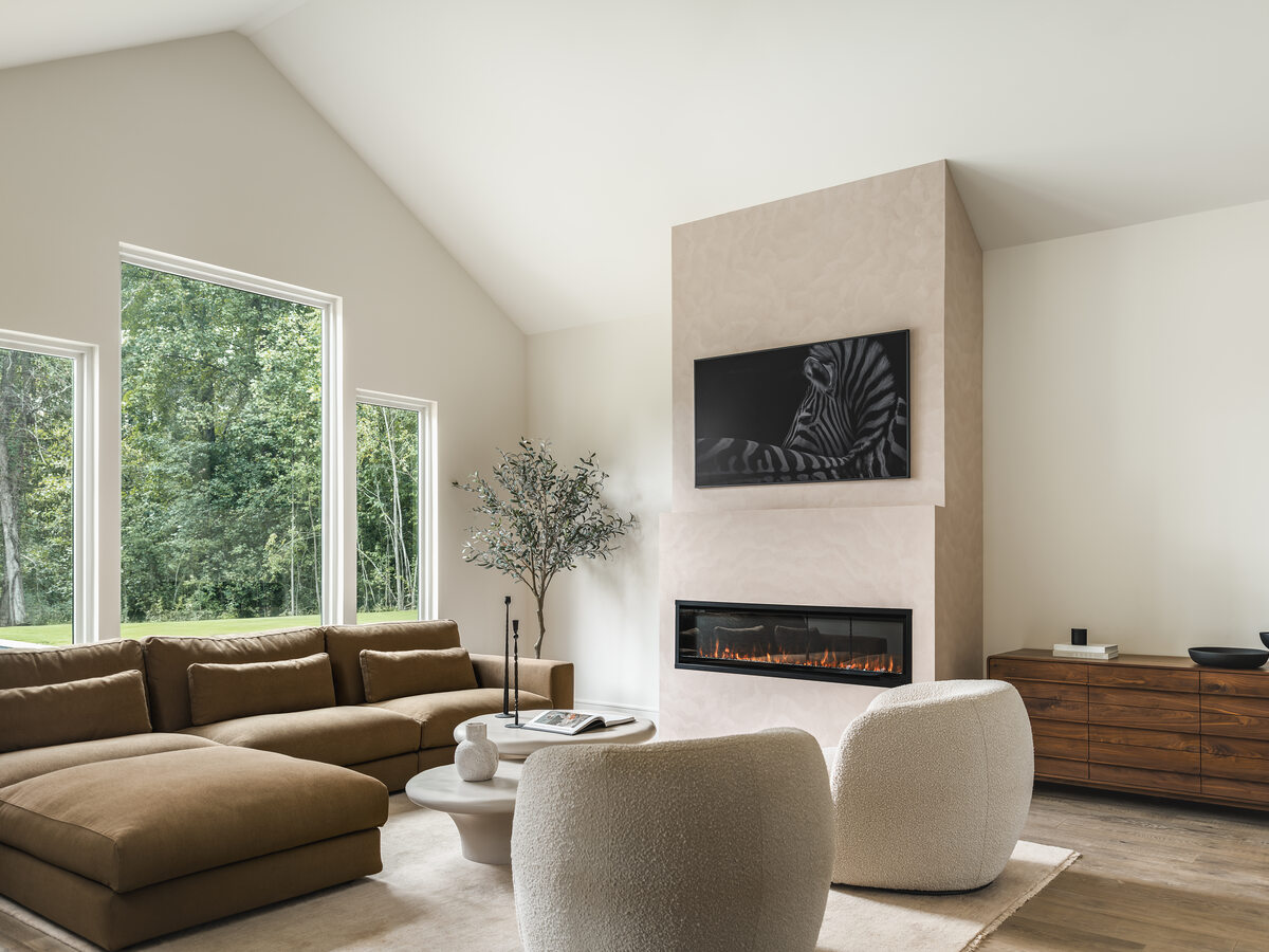 Open-plan living room with custom millwork furniture