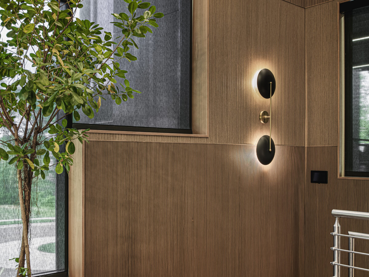Hallway millwork paneling with architectural lighting